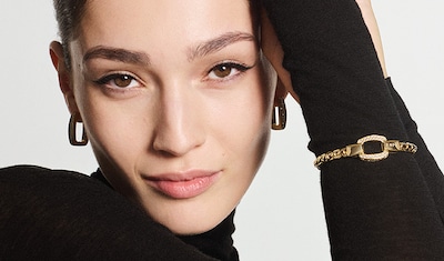 Shop Fope Jewellery on Mappin & Webb. Image of model wearing Fope jewellery image