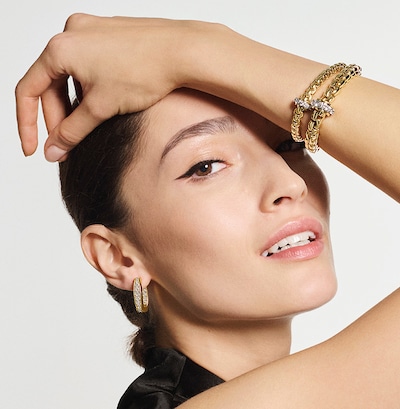 Fope Eka Collection with model wearing jewellery. Tap to shop image