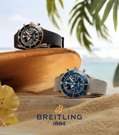 Breitling Superocean watches in beach setting image
