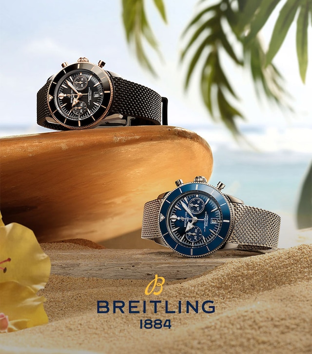 Breitling Superocean watches in beach setting image