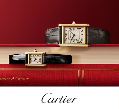Cartier Valentines campaign with Mens & Ladies Tank watches on red covered books image