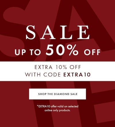 Red sale banner with reads Up to 50% off Diamond Jewellery with extra 10% off with code EXTRA10 - selected lines only. *EXTRA10 offer valid on selected online only products. Shop the sale. image