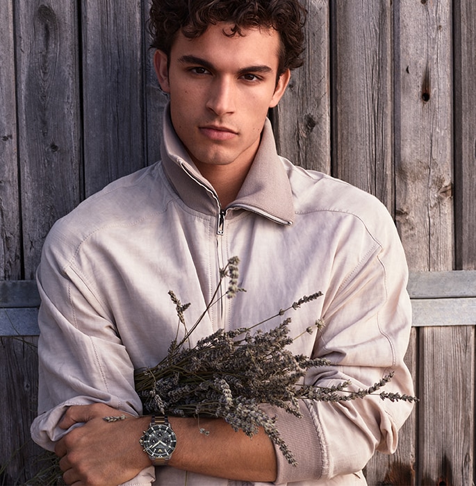 Emporio Armani male model wearing watch image