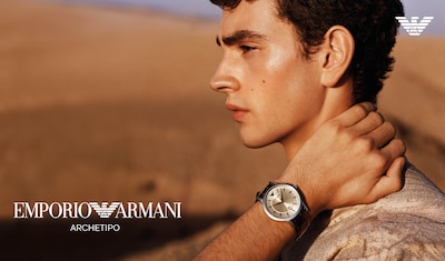 Image of two men wearing Emporio Armani watch with Emporio Armani logo in the middle. image