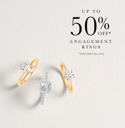 Image of engagement rings on grey background. up to 50% off engagement rings. selected lines only - tap to shop image