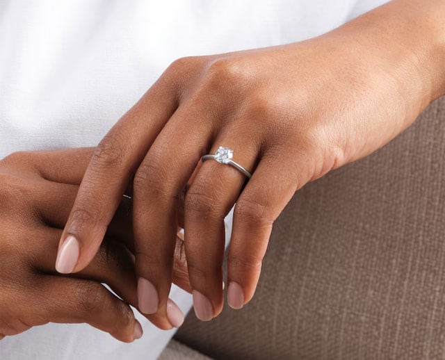 Goldsmiths model wearing GIA Certified Diamond ring image