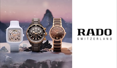 Three elegant Rado watches displayed in a snowy landscape, showcasing modern designs with a white, black, and rose gold finish watches with Rado log on the side. image