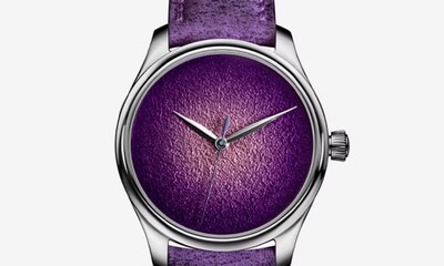Image of purple H.Moser & Cie Endeavour watch. The Endeavour distils elegance to its essentials, pairing clean lines with quietly striking dials. image