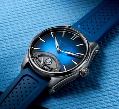 H. Moser & Cie Pioneer watch with blue dial on blue background. Tap to shop image