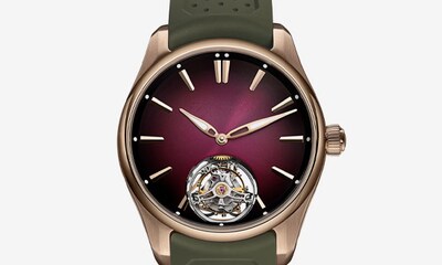 H.Moser & Cie Pioneer watch with khaki strap and maroon dial. The Pioneer brings everyday durability and bold design together, offering adventure-ready luxury with Moser’s signature finesse. image
