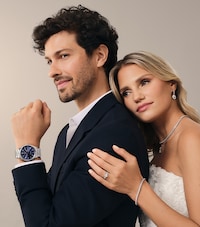 Shop Wedding Day Jewellery and Wedding Rings on Mappin & Webb with image of couple image