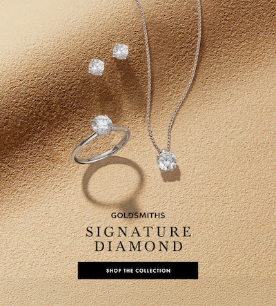 Image of Goldsmiths Signature Diamond jewellery set on sandy background image