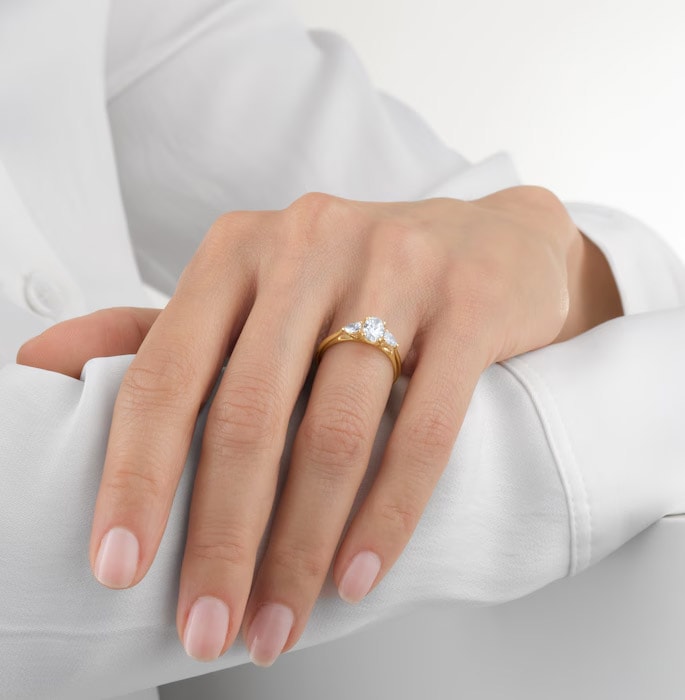 Image of model wearing GIA three stone ring image