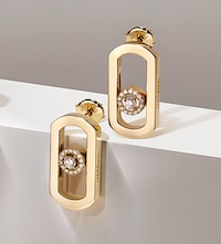 Messika campaign imagery and earrings on brand background. Tap to shop Messika Paris Earrings image