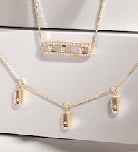 Messika campaign imagery and necklaces on brand background. Tap to shop Messika Paris Necklaces image