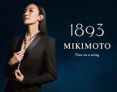 Michelle Yeoh wearing Mikimoto Jewelry in brand campaign. 1893 Mikimoto. Time On A String. Tap to shop image