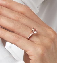Image of Gemstone engagement ring on model image