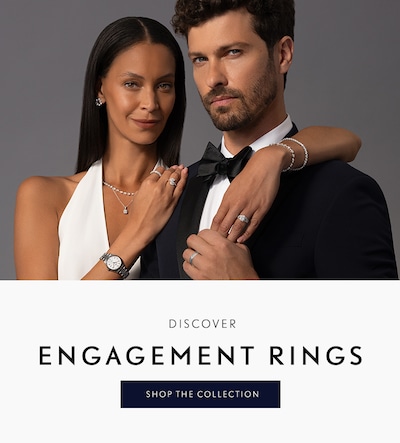 Couple on wedding day wearing bridal jewellery and engagement rings from mappin & webb with CTA to shop all image