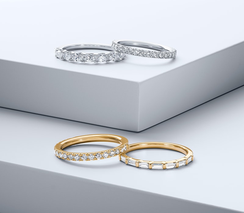 Image of Wedding Rings on white stepped background image