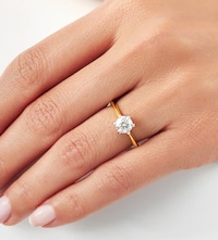 Image of Yellow Gold Diamond engagement ring on model image
