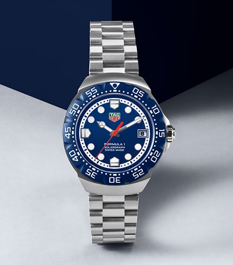 TAG Heuer F1 Solograph Watch on navy background image