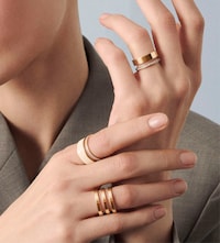 Woman wearing Repossi Rose Gold Ring stack image