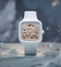 Rado True Square Automatic white bracelet watch with snowy background image