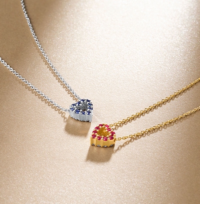 Roberto Coin Tiny Treasures collection - Pair of double sided heart pendants image