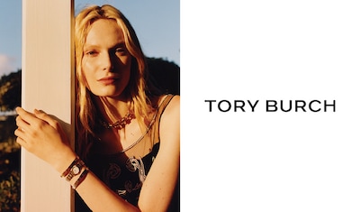 Image of woman wearing Tory Burch watch and bracelets image