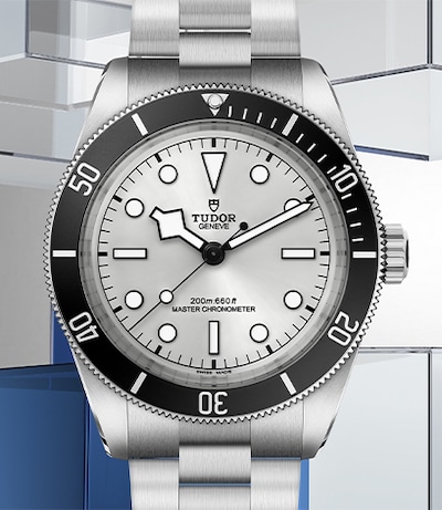 Tudor Black Bay 68 Watch on Grey and blue Background. Tap to shop TUDOR watches image