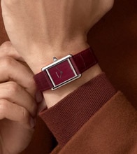 Red Cartier Tank on model. Tap to shop Luxury Watches image