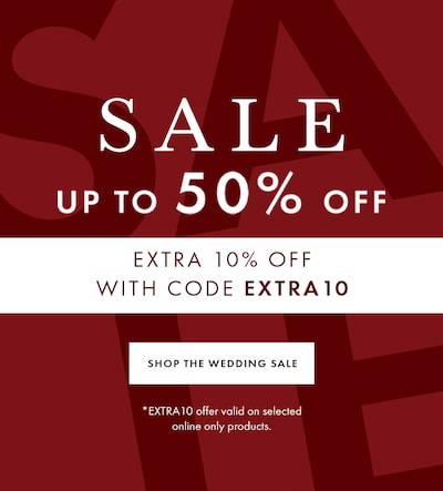 Red sale banner with reads Up to 50% off Wedding Rings with extra 10% off with code EXTRA10 - selected lines only. *EXTRA10 offer valid on selected online only products. Shop the sale. image