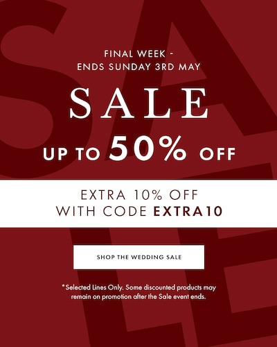 Red sale banner with reads Up to 50% off Wedding Rings. Extra 10% Off with code EXTRA10 - selected lines only. Final week - ends Sunday 3rd May. *Selected Lines Only. Some discounted products may remain on promotion after the Sale event ends. image