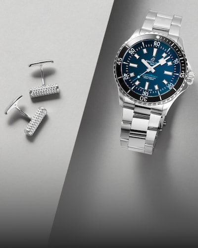 Breitling watch and cufflinks image image
